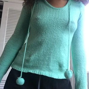 Long sleeve hoodie with Pom Poms